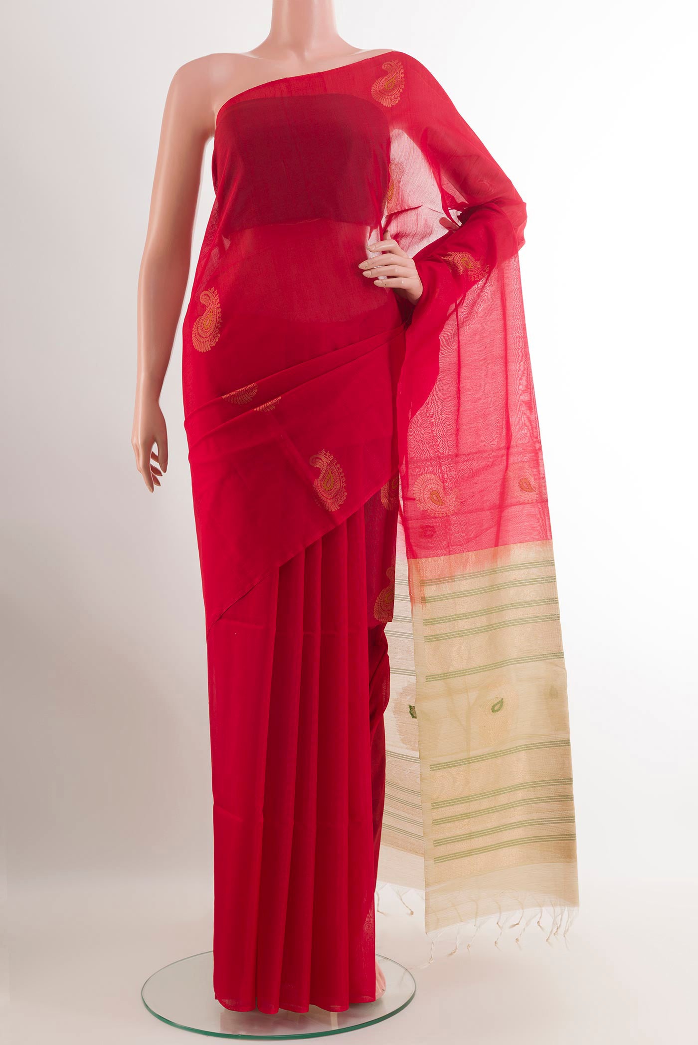 Red Blended Kora Cotton Saree with Thread Butta on the body and Zari Border.  displayed on a mannequin