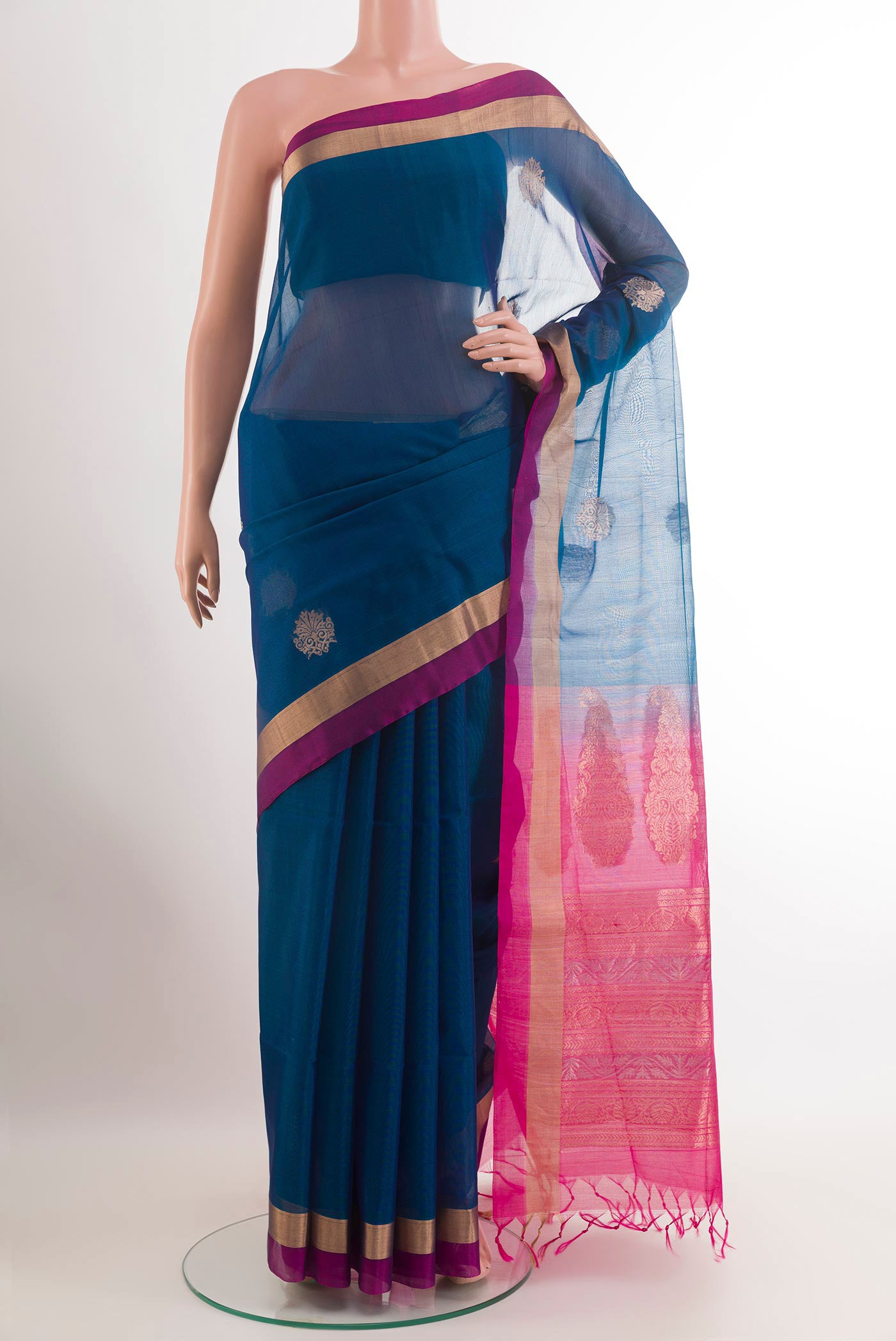 Dark Blue Blended Kora Cotton Saree with Zari Butta on the body and Zari Border.  displayed on a mannequin