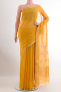 Yellow Blended Kora Cotton Saree with Zari Butta on the body and Zari Border.  displayed on a mannequin