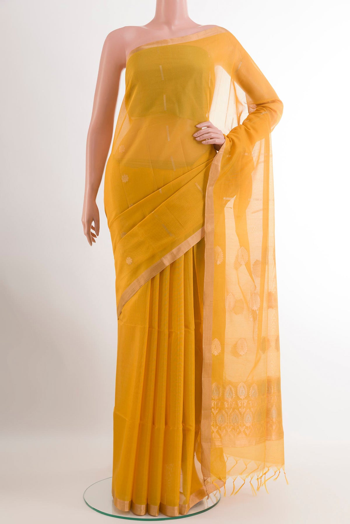 Yellow Blended Kora Cotton Saree with Zari Butta on the body and Zari Border.  displayed on a mannequin