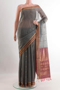 Grey Blended Kora Cotton Saree with Zari Butta on the body and Zari Border.  displayed on a mannequin