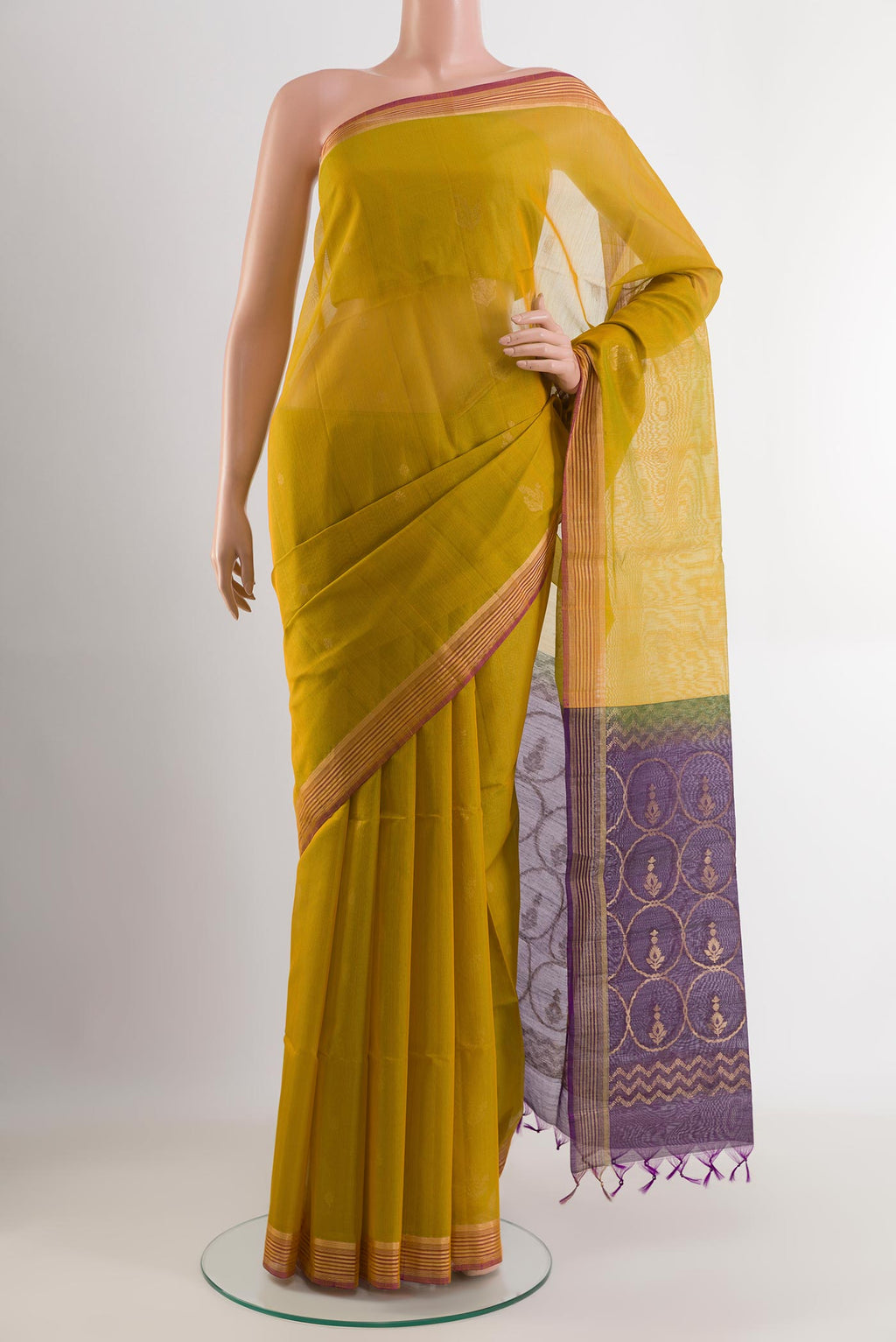 Yellow Blended Kora Cotton Saree with Zari Butta on the body and Zari Border.  displayed on a mannequin