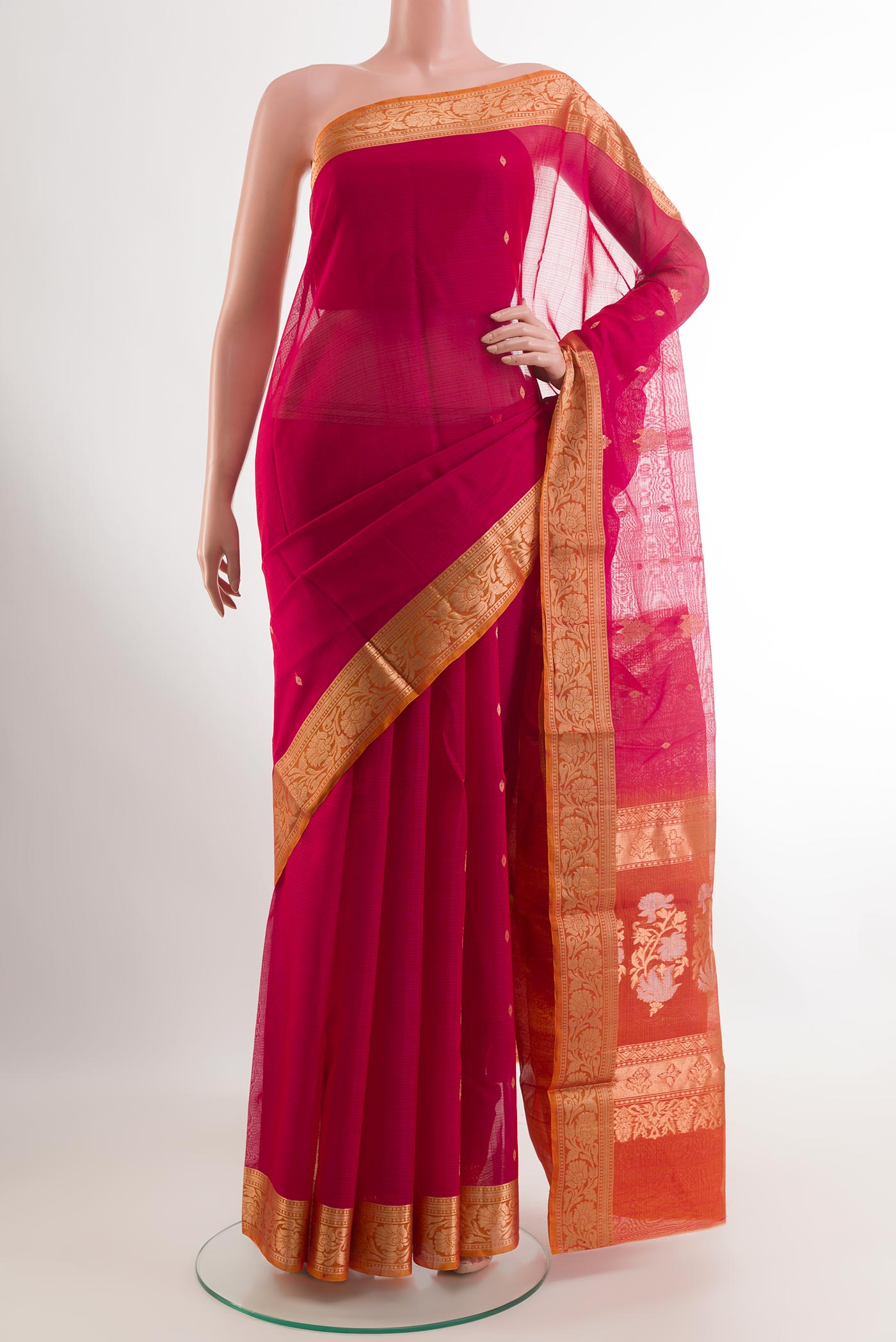 Pink Blended Kora Cotton Saree with Zari Butta on the body and Plain Border.  displayed on a mannequin