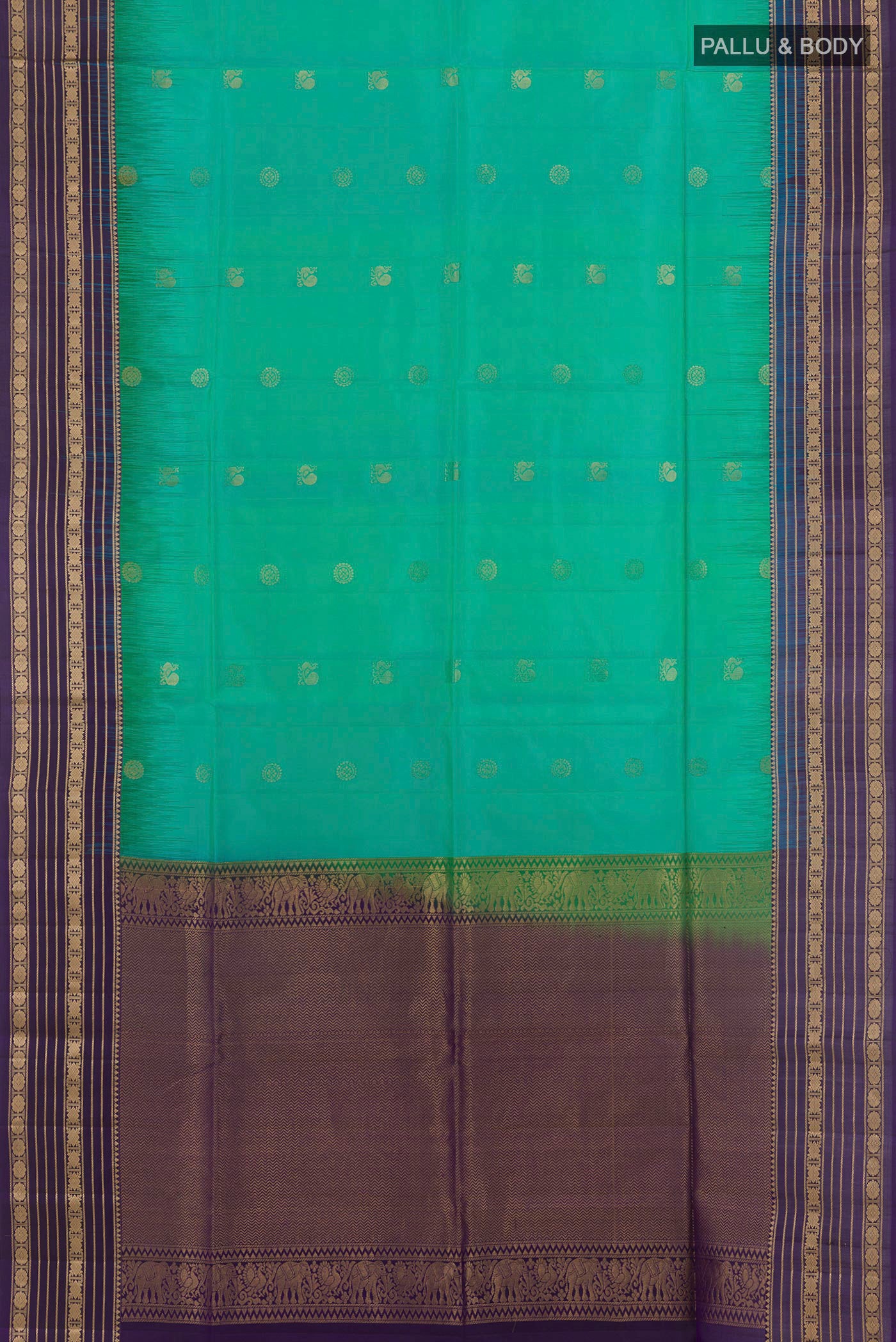 Flat view of Green Soft Silk Saree with Zari Butta on the body and Zari Border. 