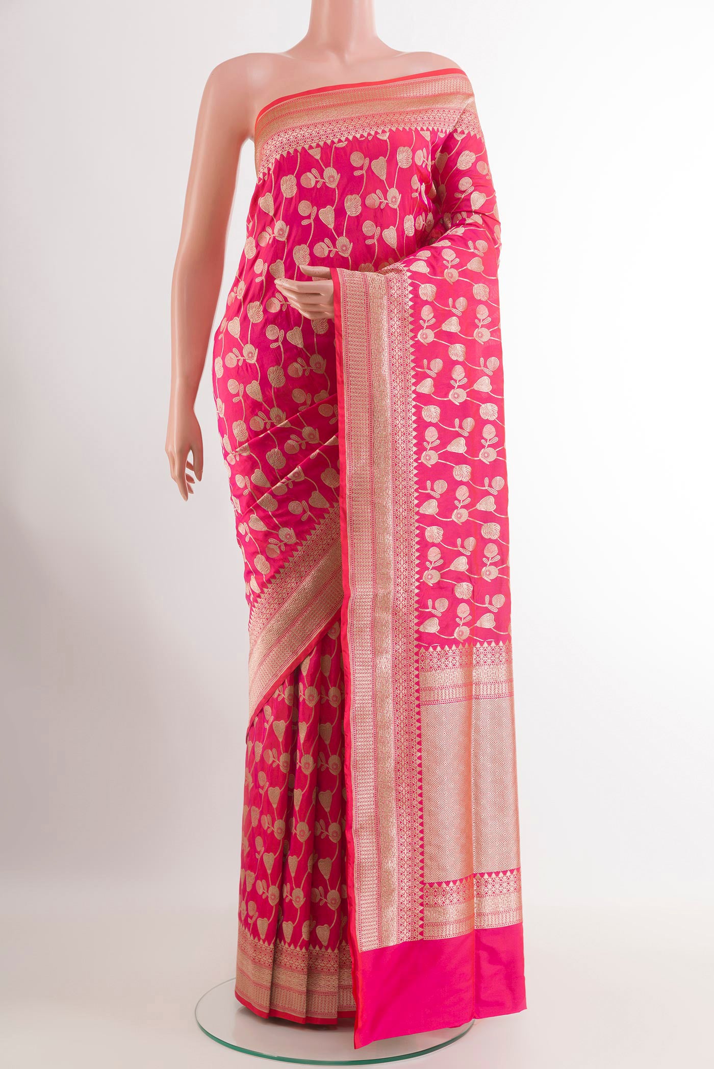Pink Banarasi Silk Saree with Zari Brocade on the body and Zari Border.  displayed on a mannequin