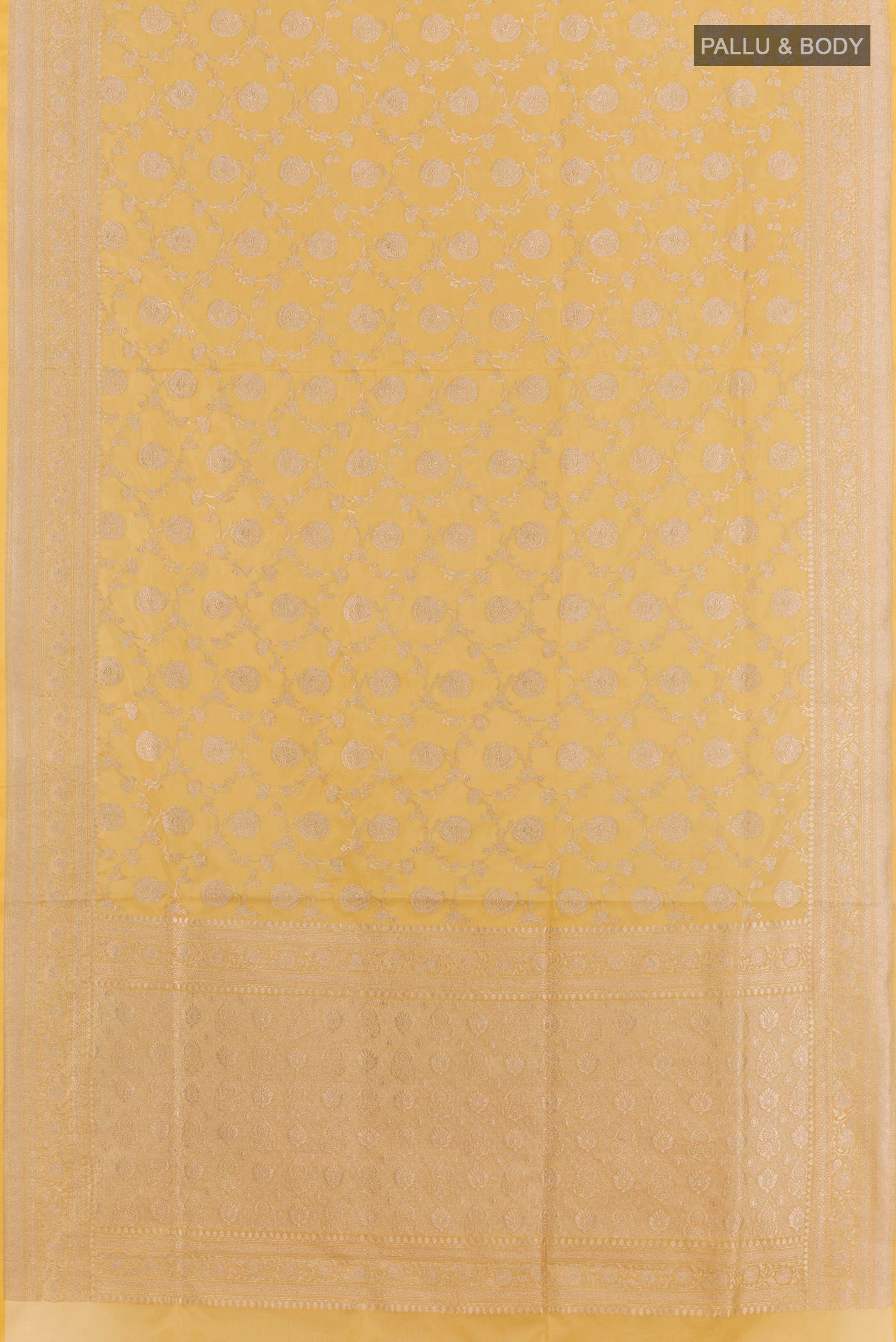 Flat view of Lemon Yellow Banarasi Silk Saree with Zari Brocade on the body and Zari Border. 
