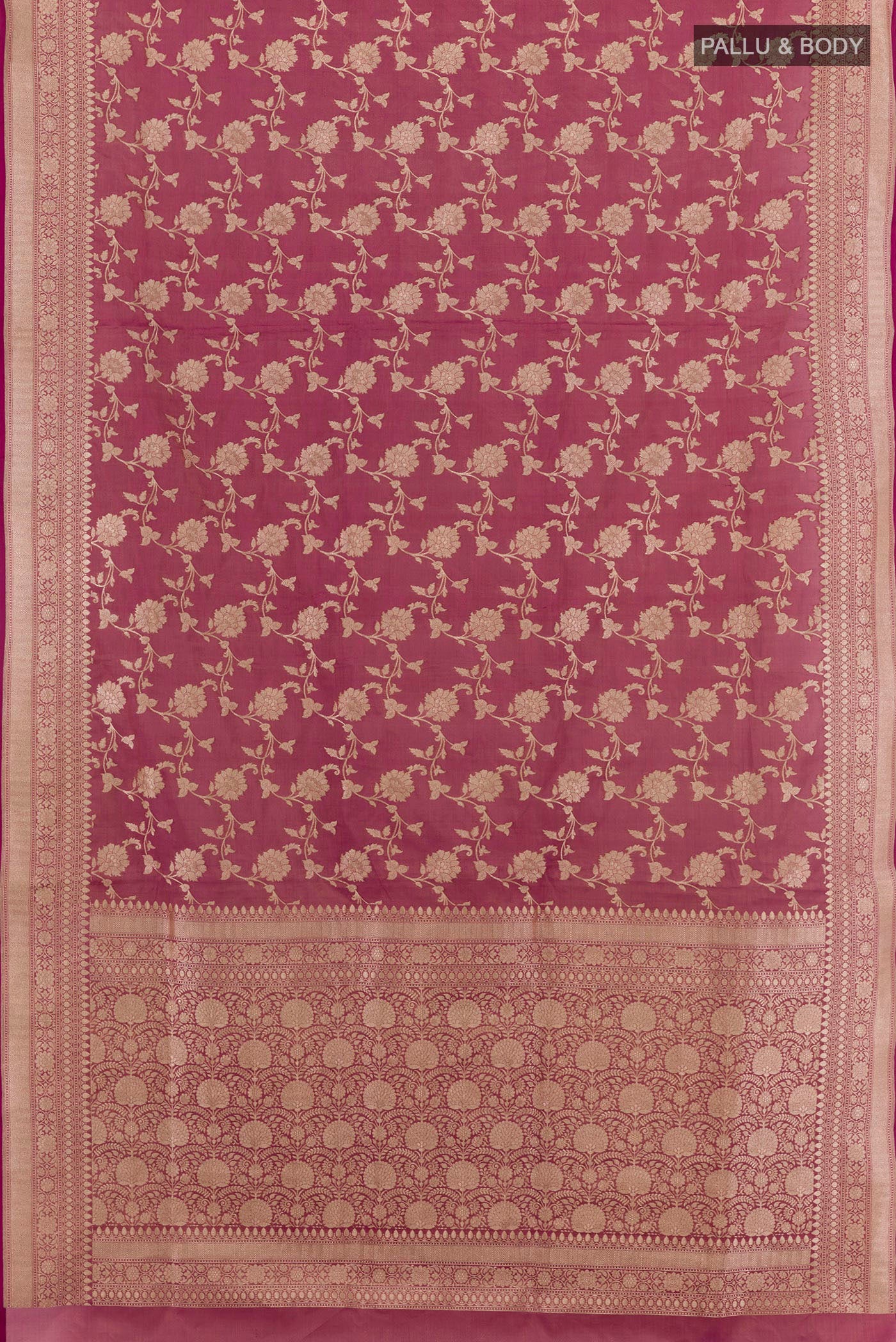 Flat view of Purple Banarasi Silk Saree with Zari Brocade on the body and Zari Border. 