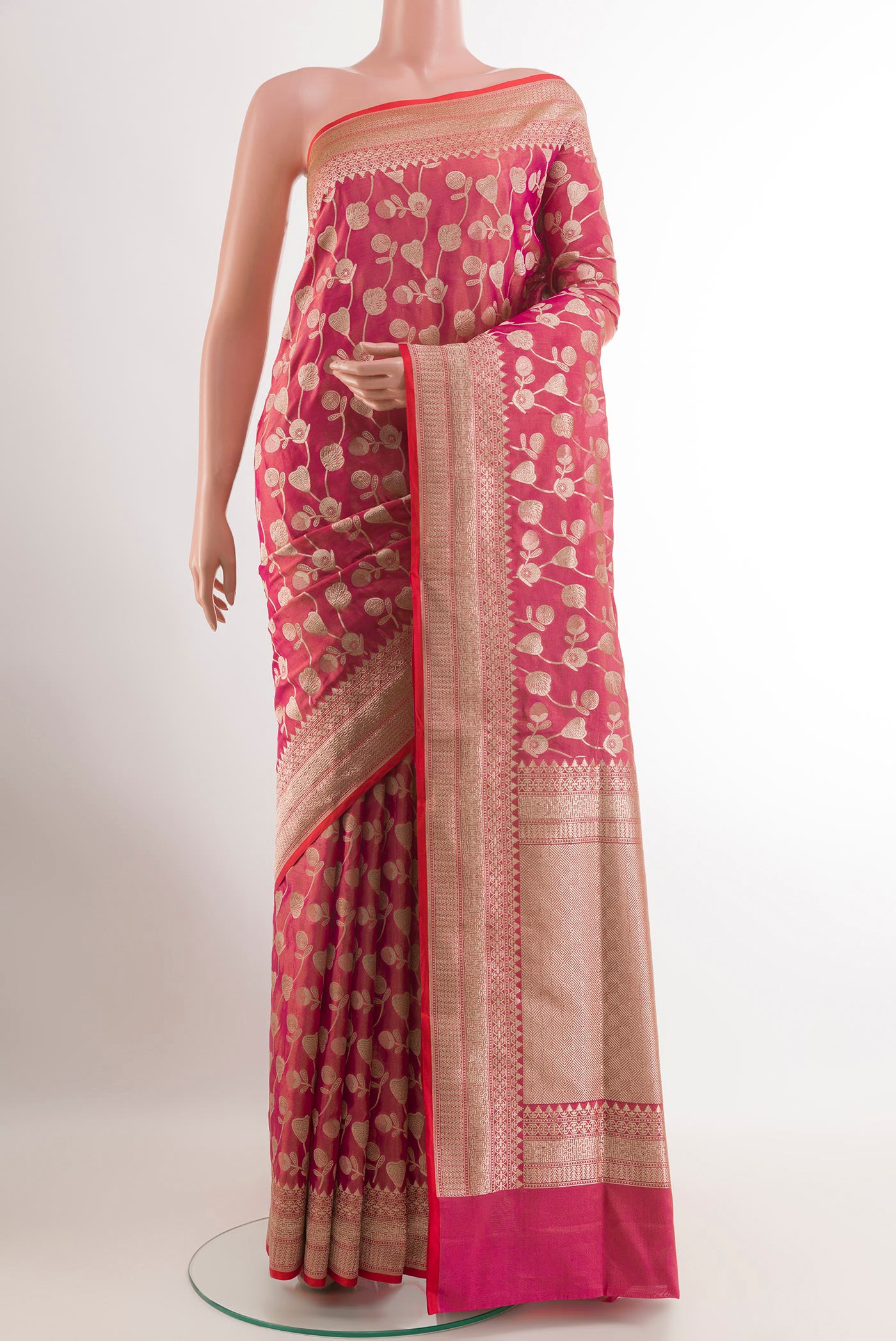 Pink Banarasi Silk Saree with Zari Brocade on the body and Zari Border.  displayed on a mannequin