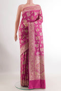 Pink Banarasi Silk Saree with Zari Brocade on the body and Zari Border.  displayed on a mannequin