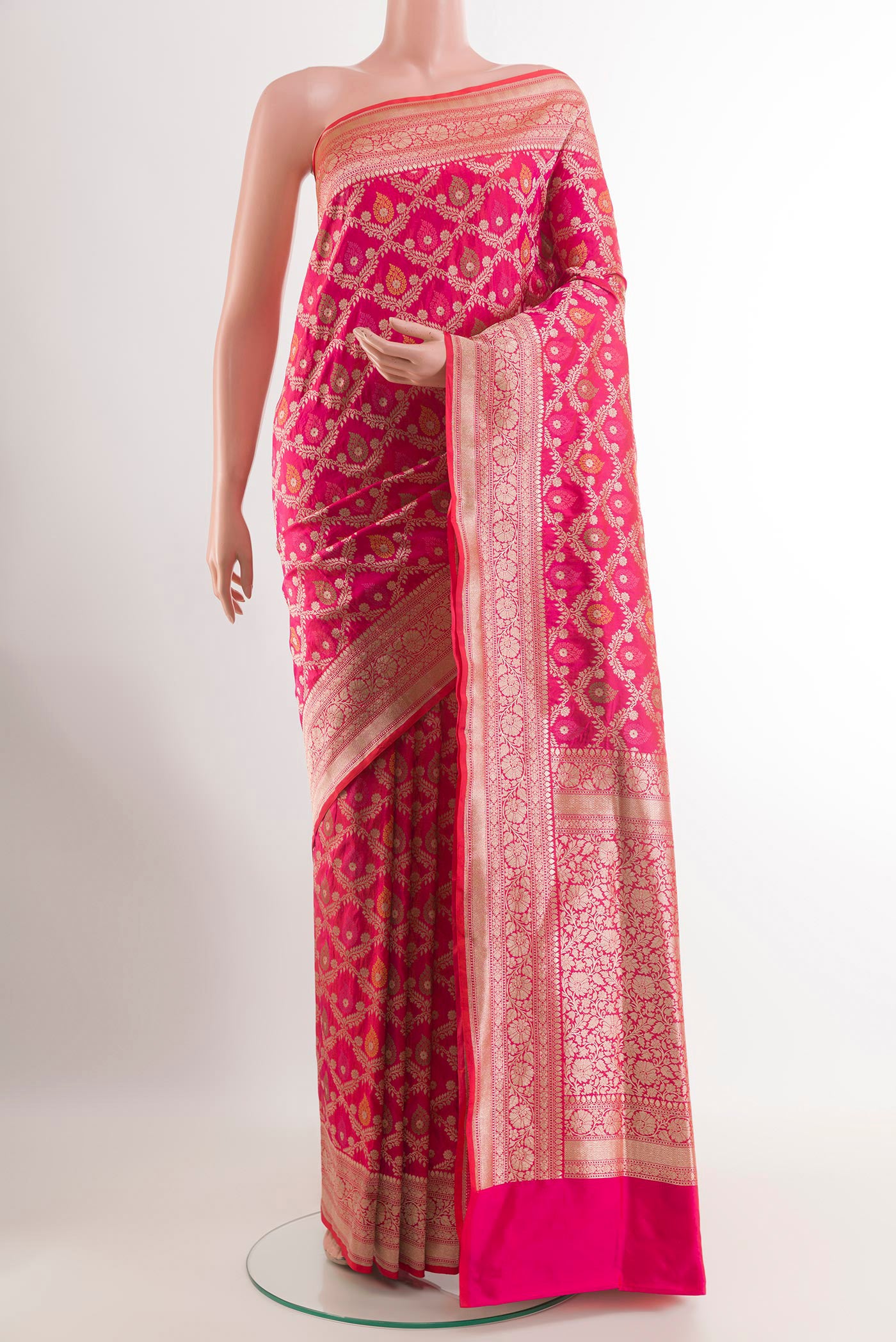 Pink Banarasi Silk Saree with Zari Brocade on the body and Zari Border.  displayed on a mannequin