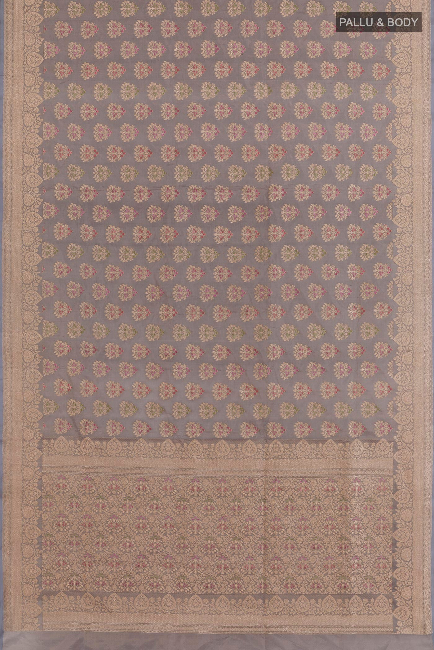 Flat view of Grey Banarasi Silk Saree with Zari Butta on the body and Zari Border. 
