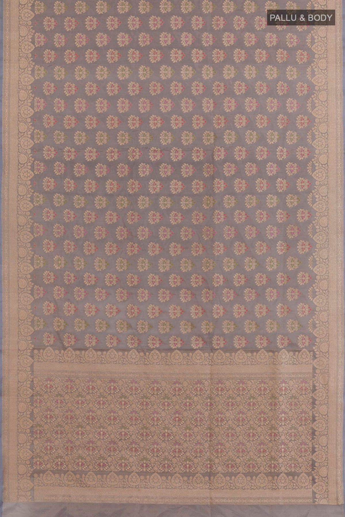 Flat view of Grey Banarasi Silk Saree with Zari Butta on the body and Zari Border. 