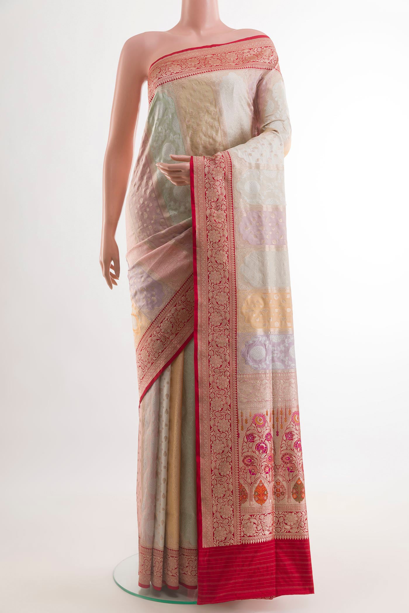 Multi Color Banarasi Silk Saree with Zari Brocade on the body and Zari Border.  displayed on a mannequin