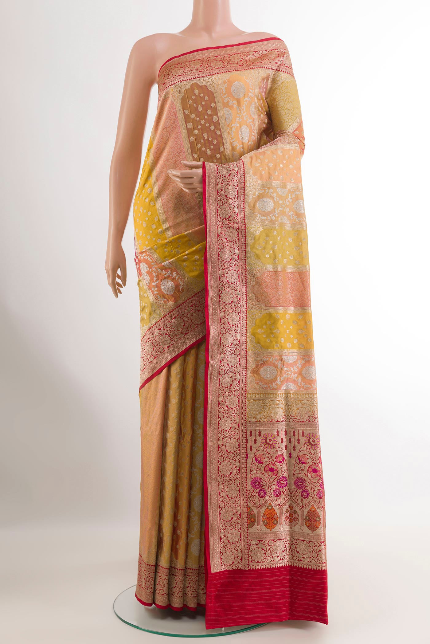 Multi Color Banarasi Silk Saree with Zari Brocade on the body and Zari Border.  displayed on a mannequin