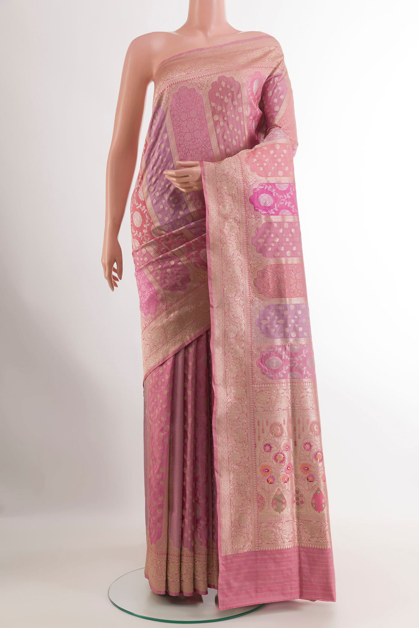 Multi Color Banarasi Silk Saree with Zari Brocade on the body and Zari Border.  displayed on a mannequin