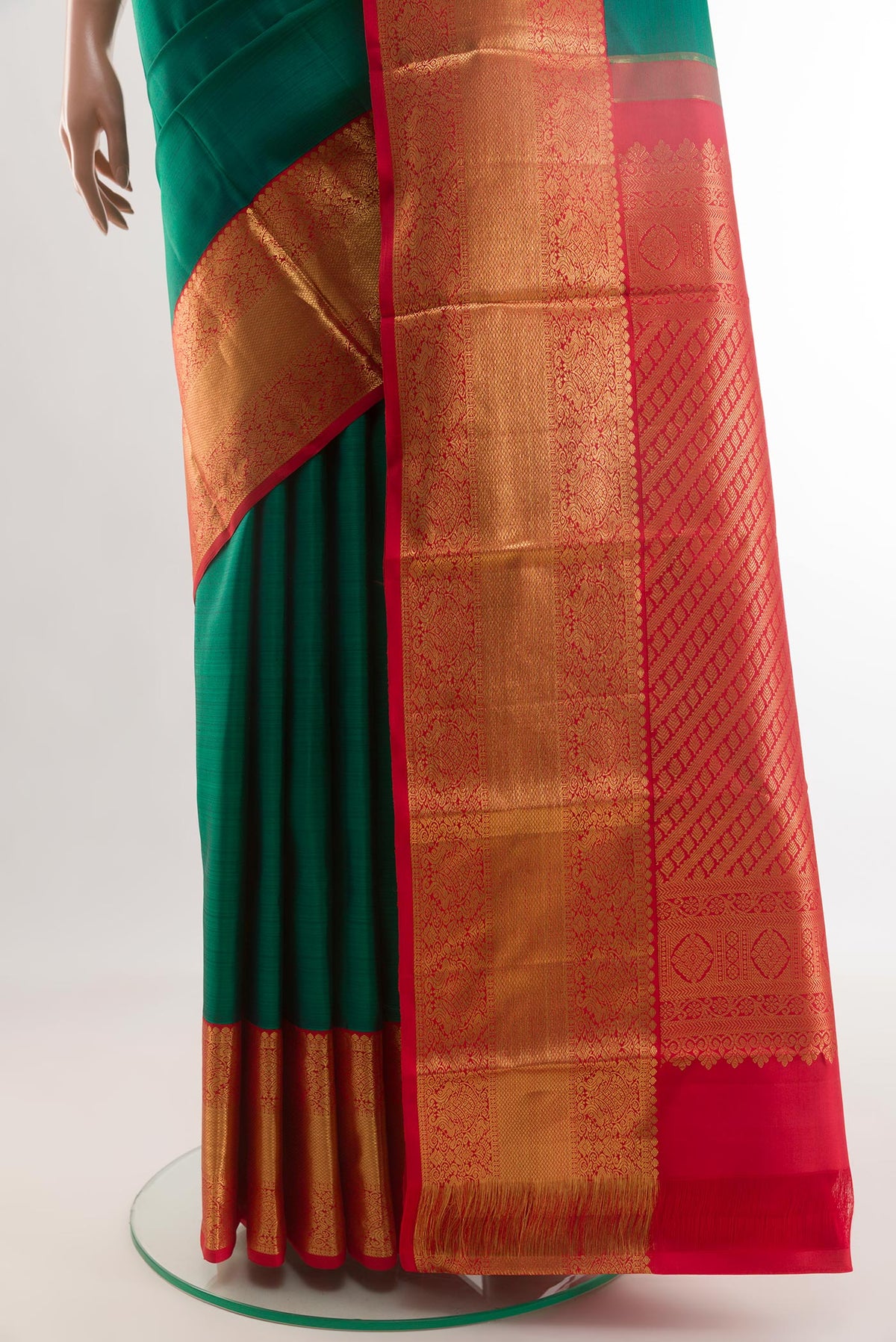 Pleats and pallu of Teal Kanjivaram Silk Saree with Zari Butta on the body and Zari Border. 