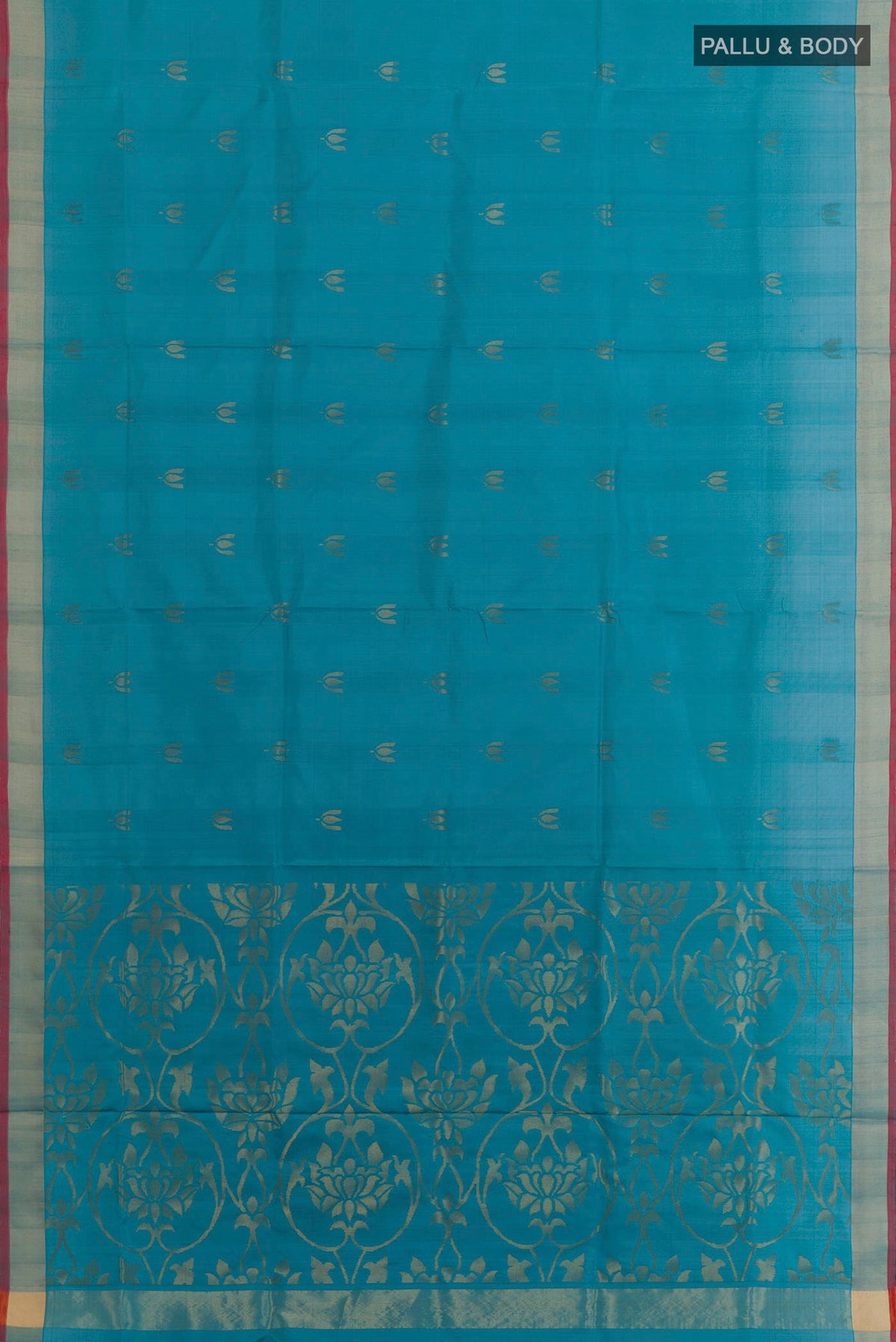 Flat view of Blue Uppada Silk Saree with Zari Butta on the body and Zari Border. 