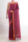 Purple Uppada Silk Saree with Zari Butta on the body and Zari Border.  displayed on a mannequin