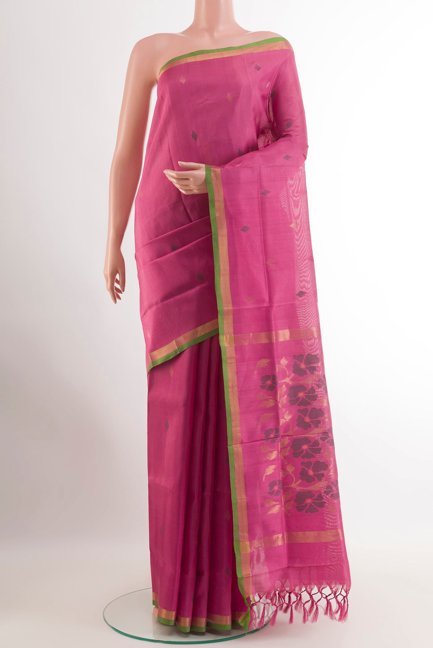 Pink Uppada Silk Saree with Zari Butta on the body and Zari Border.  displayed on a mannequin