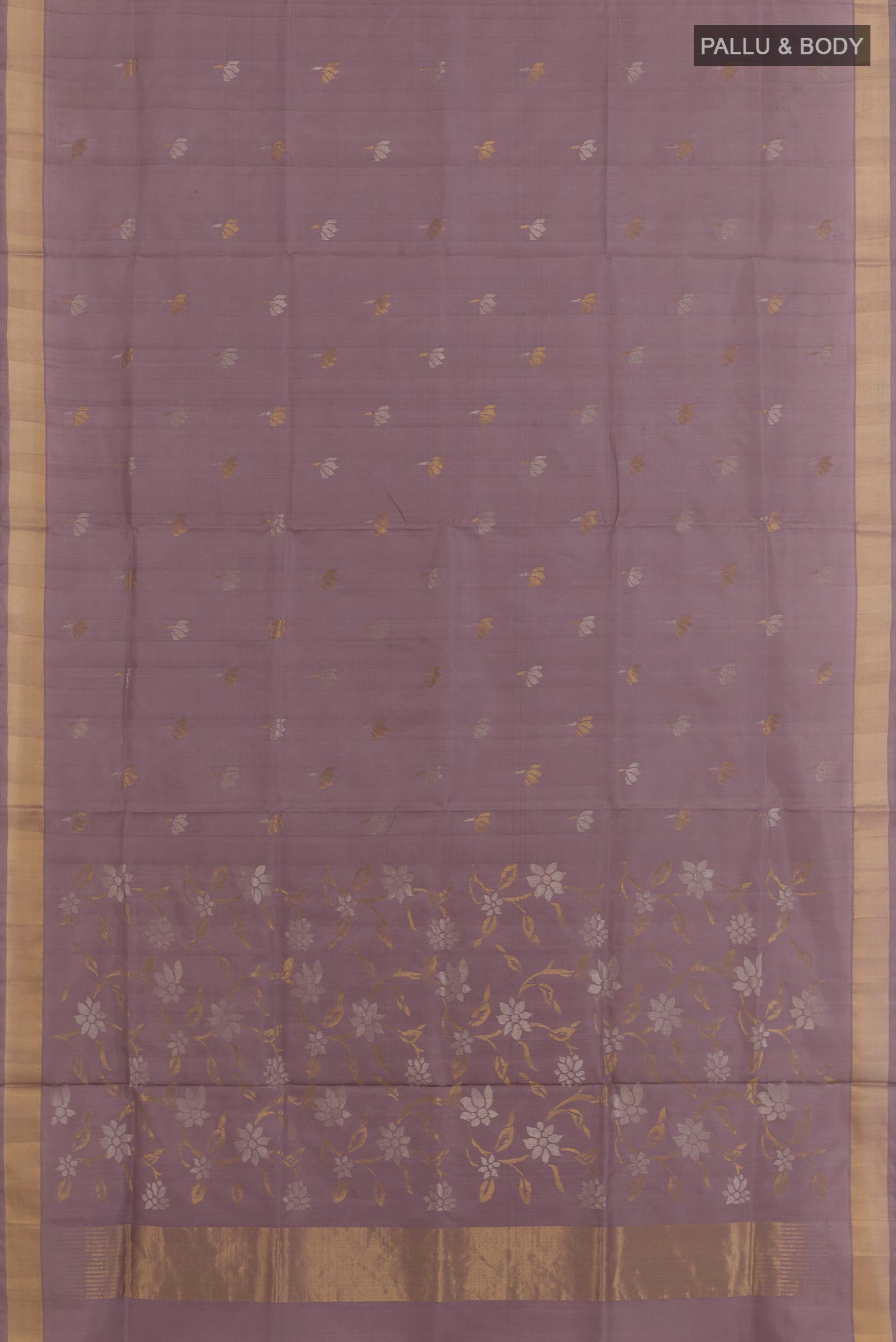 Flat view of Lavender Uppada Silk Saree with Zari Butta on the body and Zari Border. 