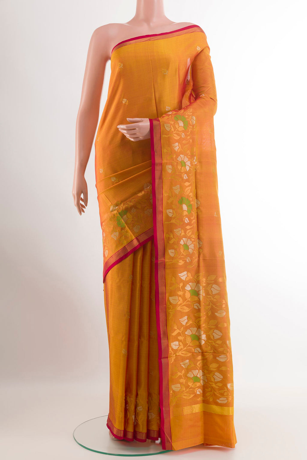 Yellow Uppada Silk Saree with Zari Butta on the body and Zari Border.  displayed on a mannequin