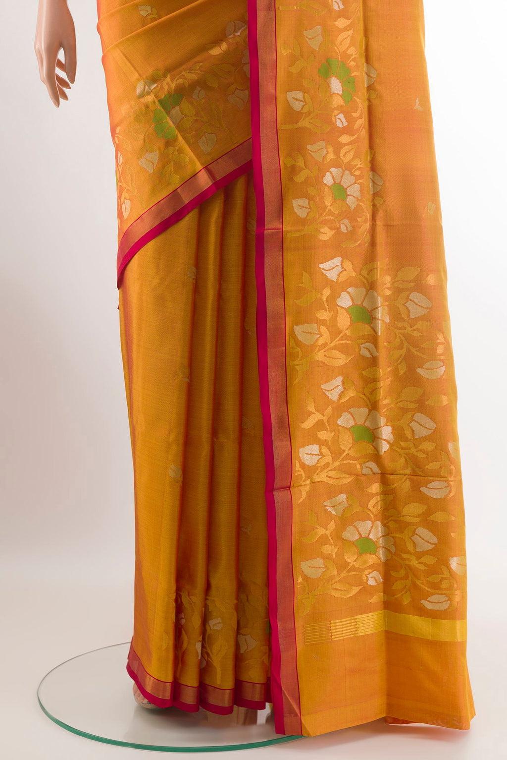 Pleats and pallu of Yellow Uppada Silk Saree with Zari Butta on the body and Zari Border. 