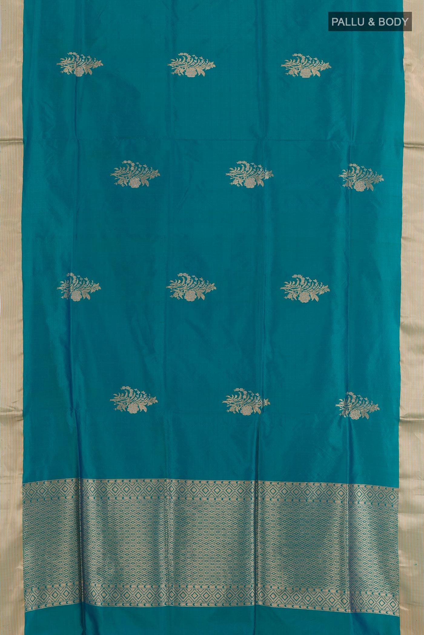Flat view of Blue Banarasi Silk Saree with Zari Butta on the body and Zari Border. 