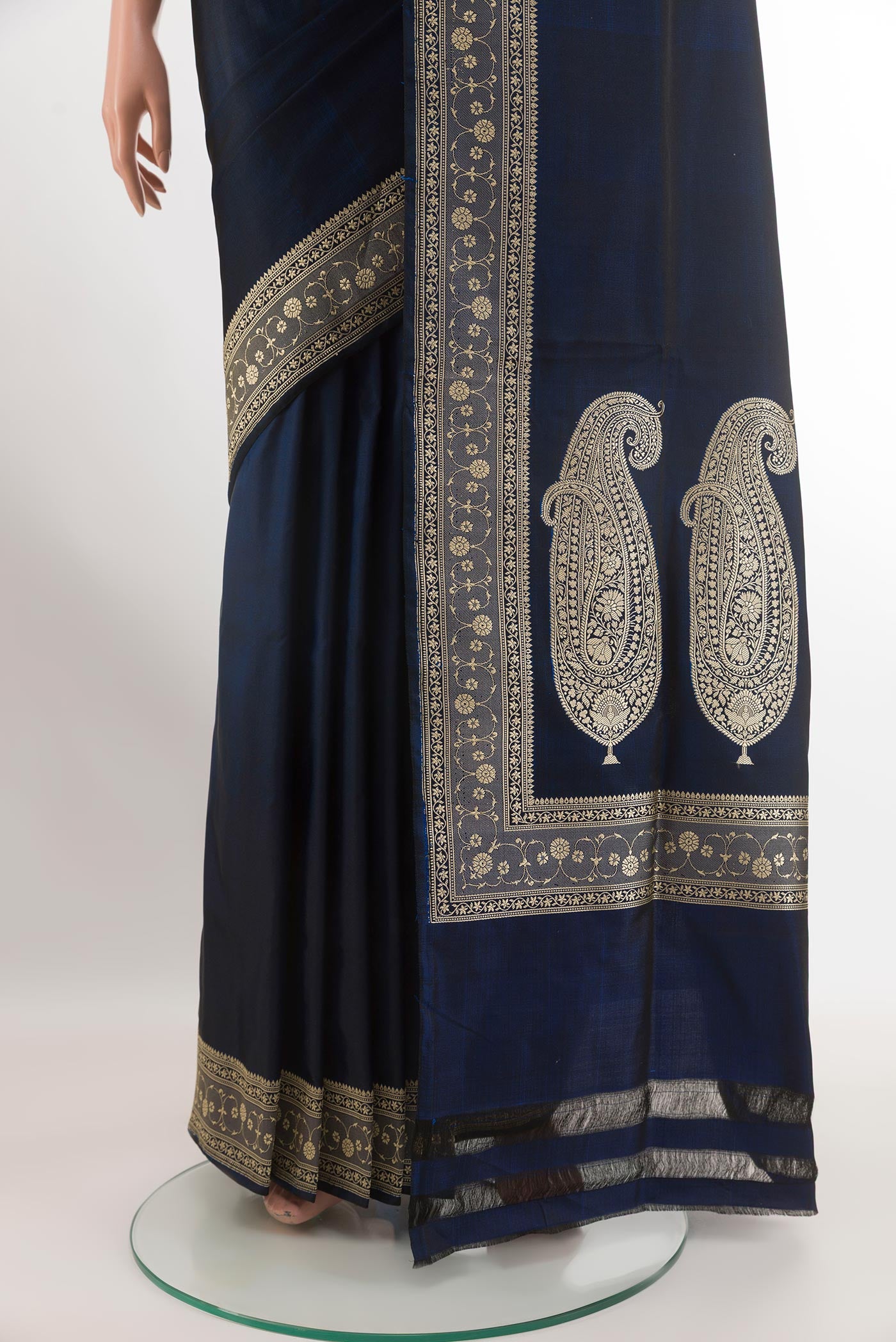 Pleats and pallu of Dark Blue Banarasi Silk Saree with Plain Body and Zari Border. 