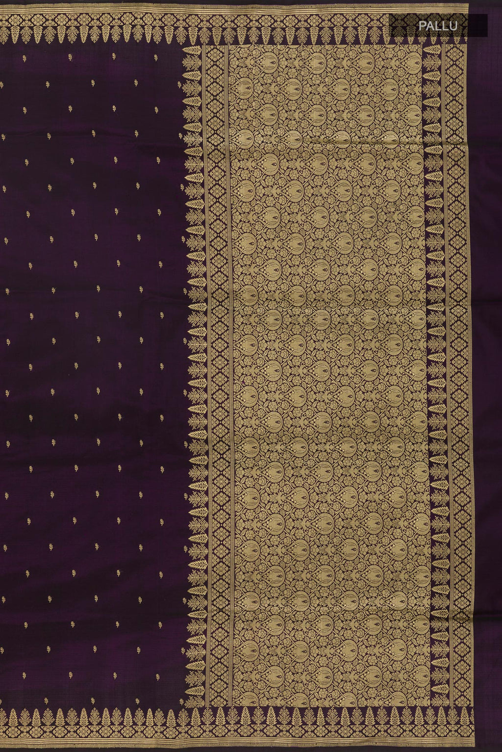Close up image of the pallu of Dark Blue Banarasi Silk Saree with Zari Butta on the body and Zari Border. 
