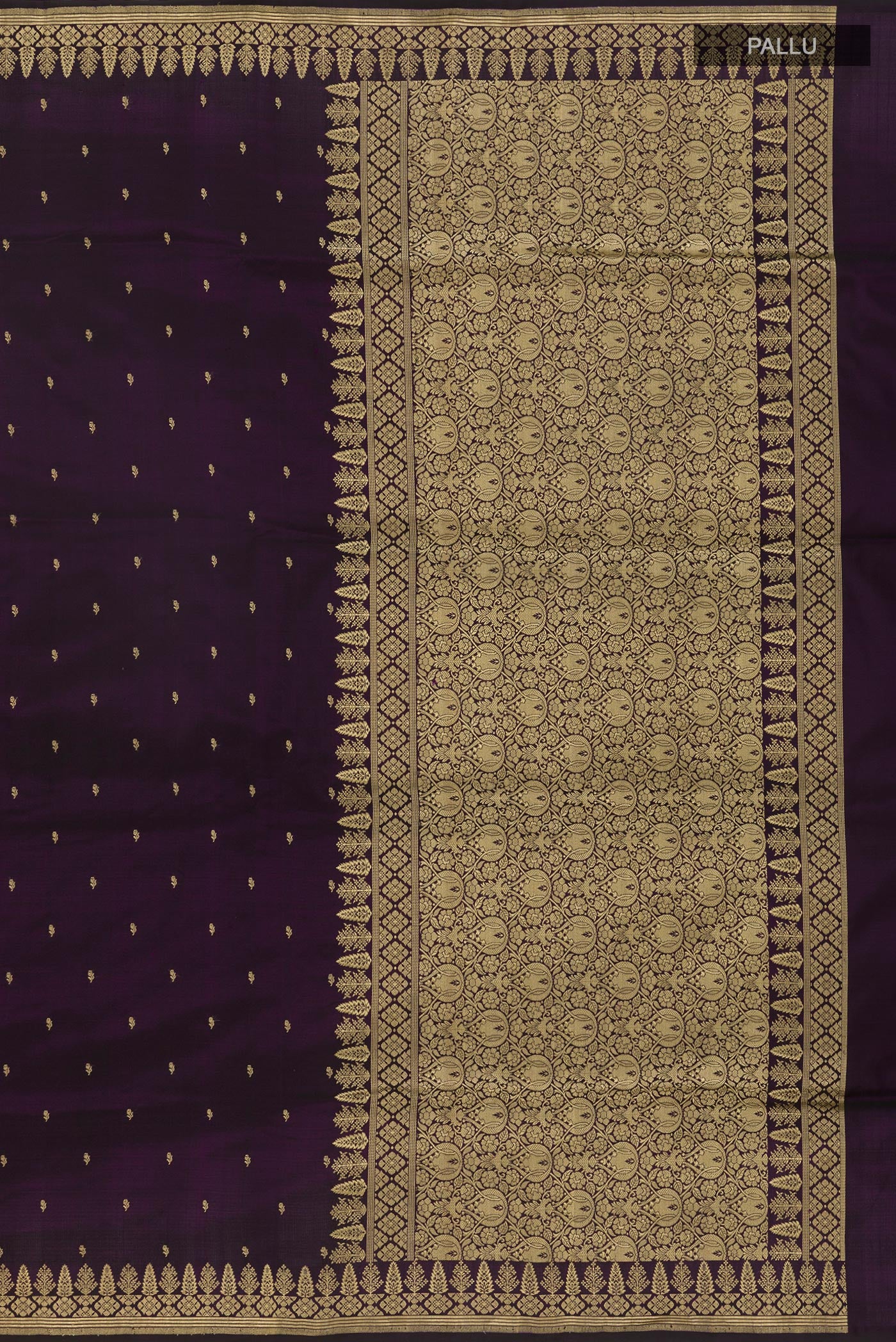 Close up image of the pallu of Dark Blue Banarasi Silk Saree with Zari Butta on the body and Zari Border. 