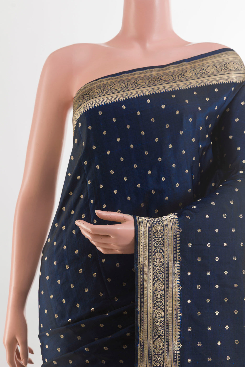 Border image of Blue Banarasi Silk Saree with Zari Butta on the body and Zari Border. 