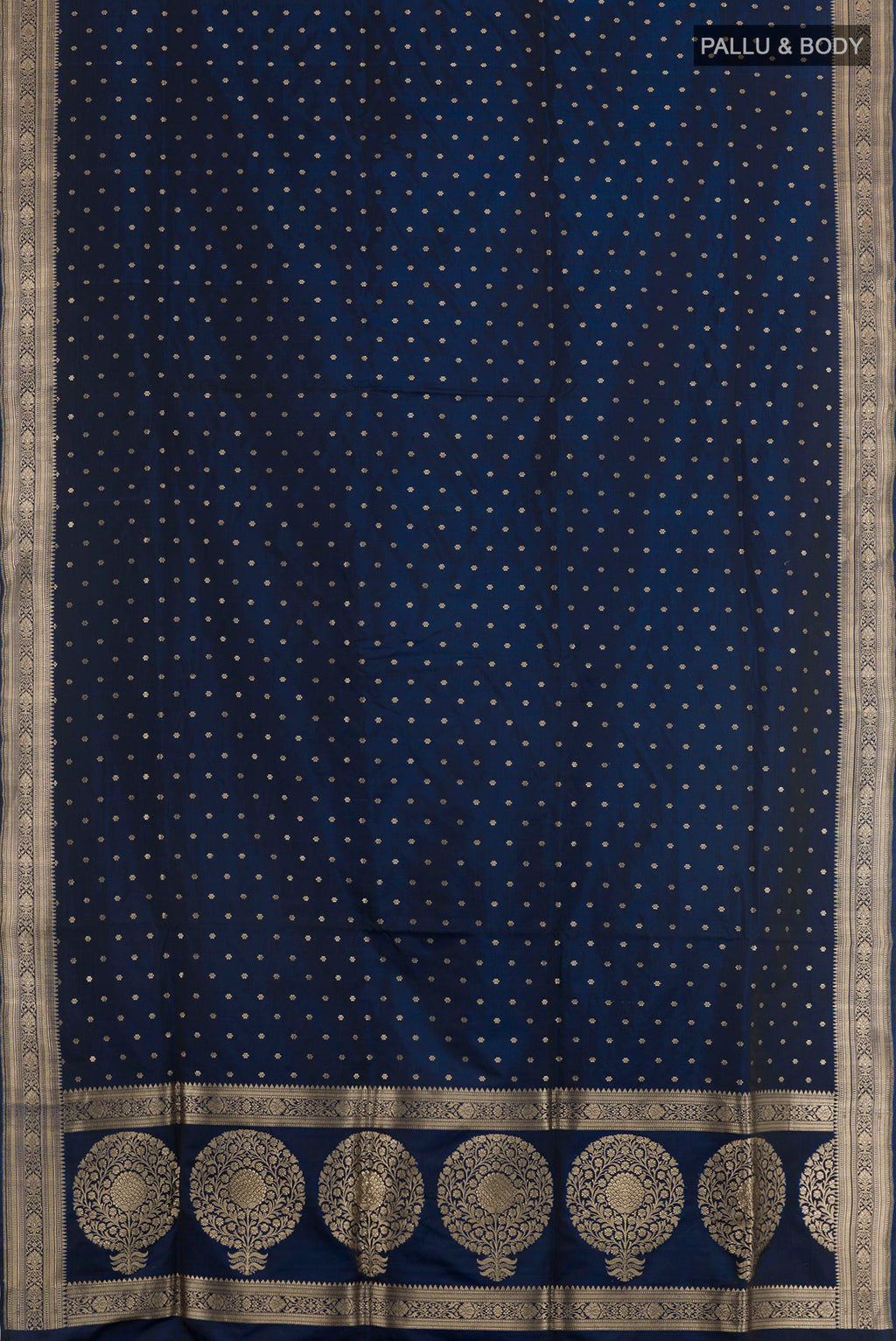 Flat view of Blue Banarasi Silk Saree with Zari Butta on the body and Zari Border. 