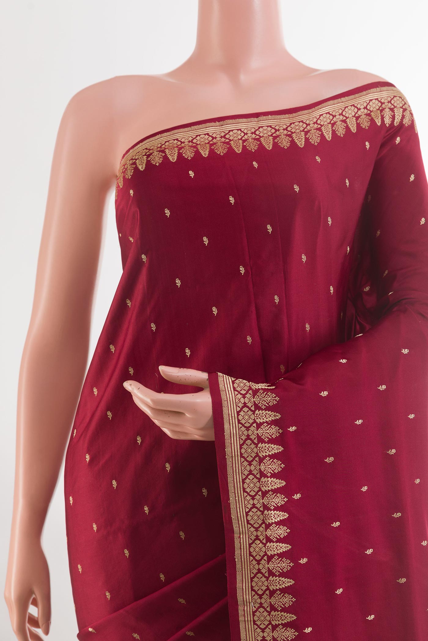 Border image of Maroon Banarasi Silk Saree with Zari Butta on the body and Zari Border. 