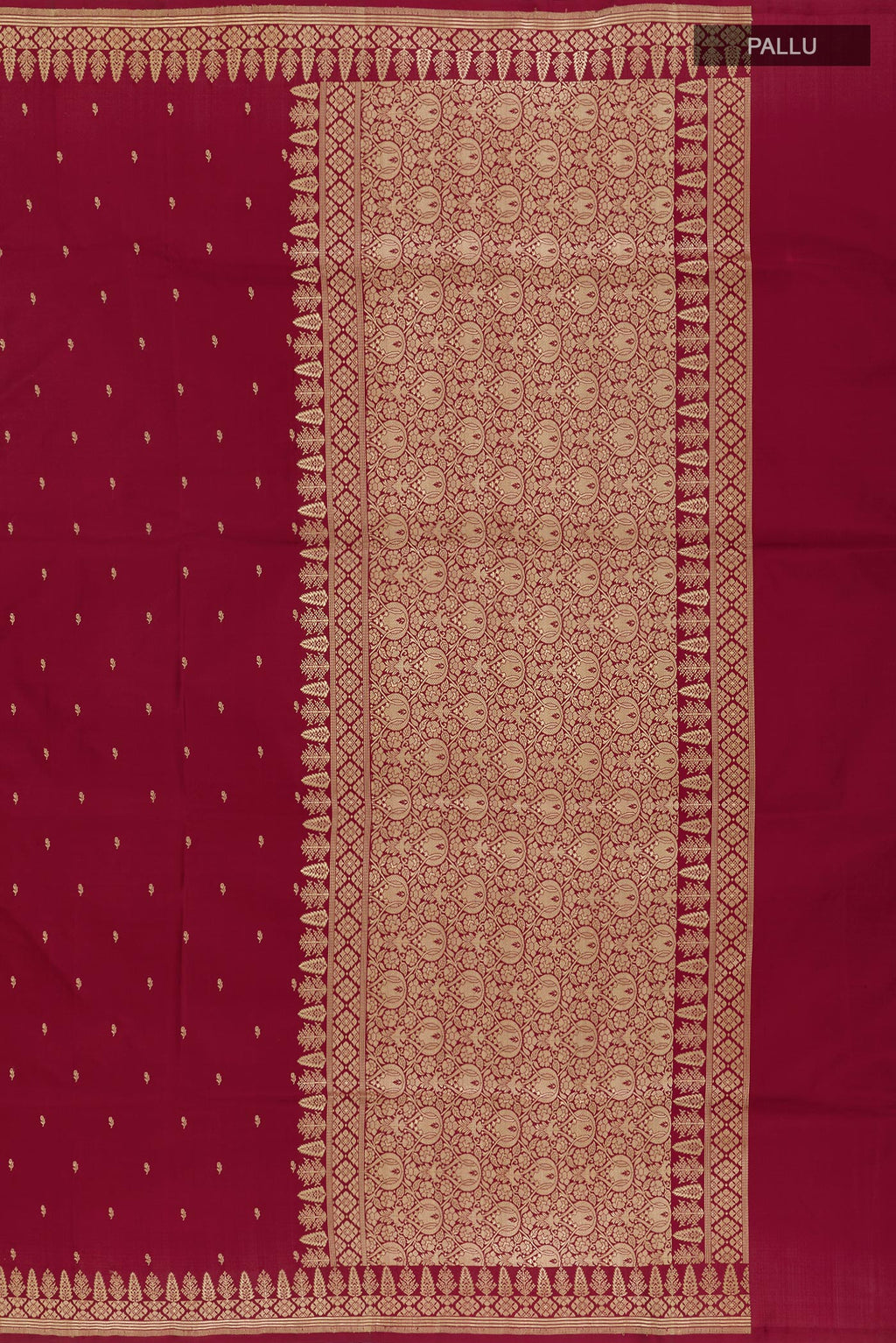 Close up image of the pallu of Maroon Banarasi Silk Saree with Zari Butta on the body and Zari Border. 