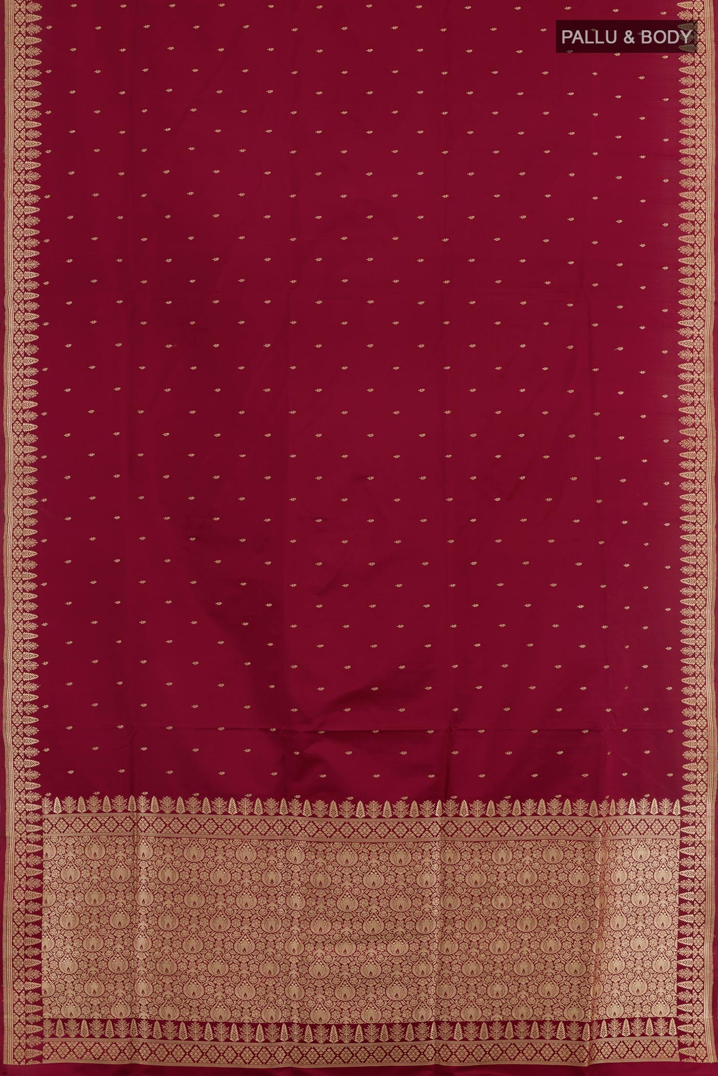 Flat view of Maroon Banarasi Silk Saree with Zari Butta on the body and Zari Border. 