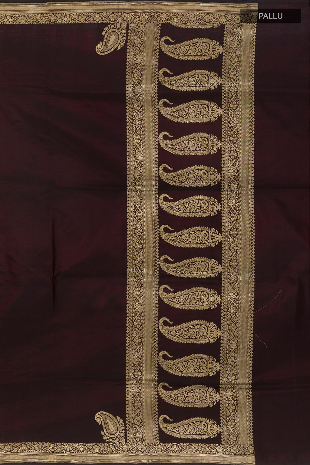Close up image of the pallu of Black Banarasi Silk Saree with Plain Body and Zari Border. 