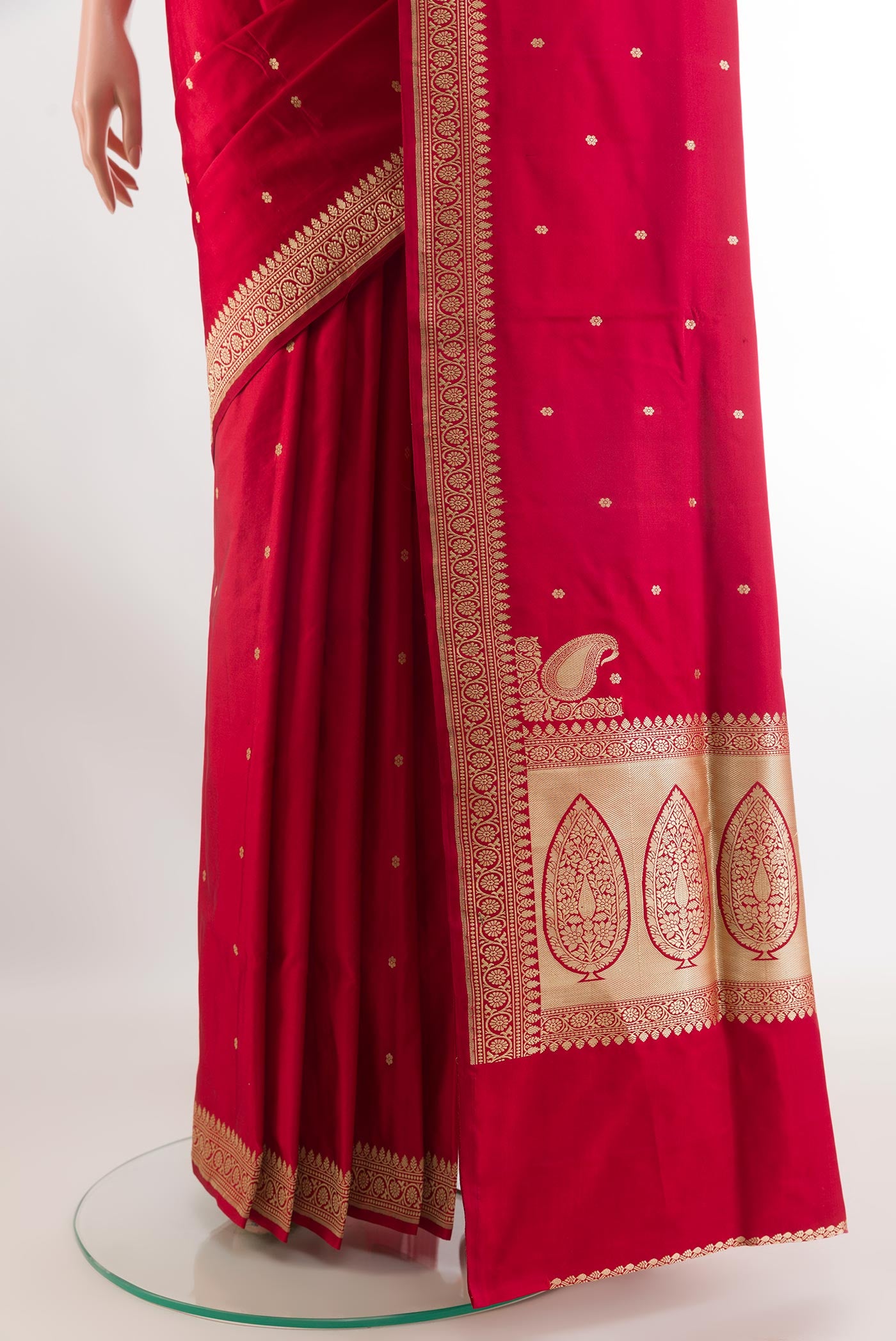 Pleats and pallu of Red Banarasi Silk Saree with Zari Butta on the body and Zari Border. 