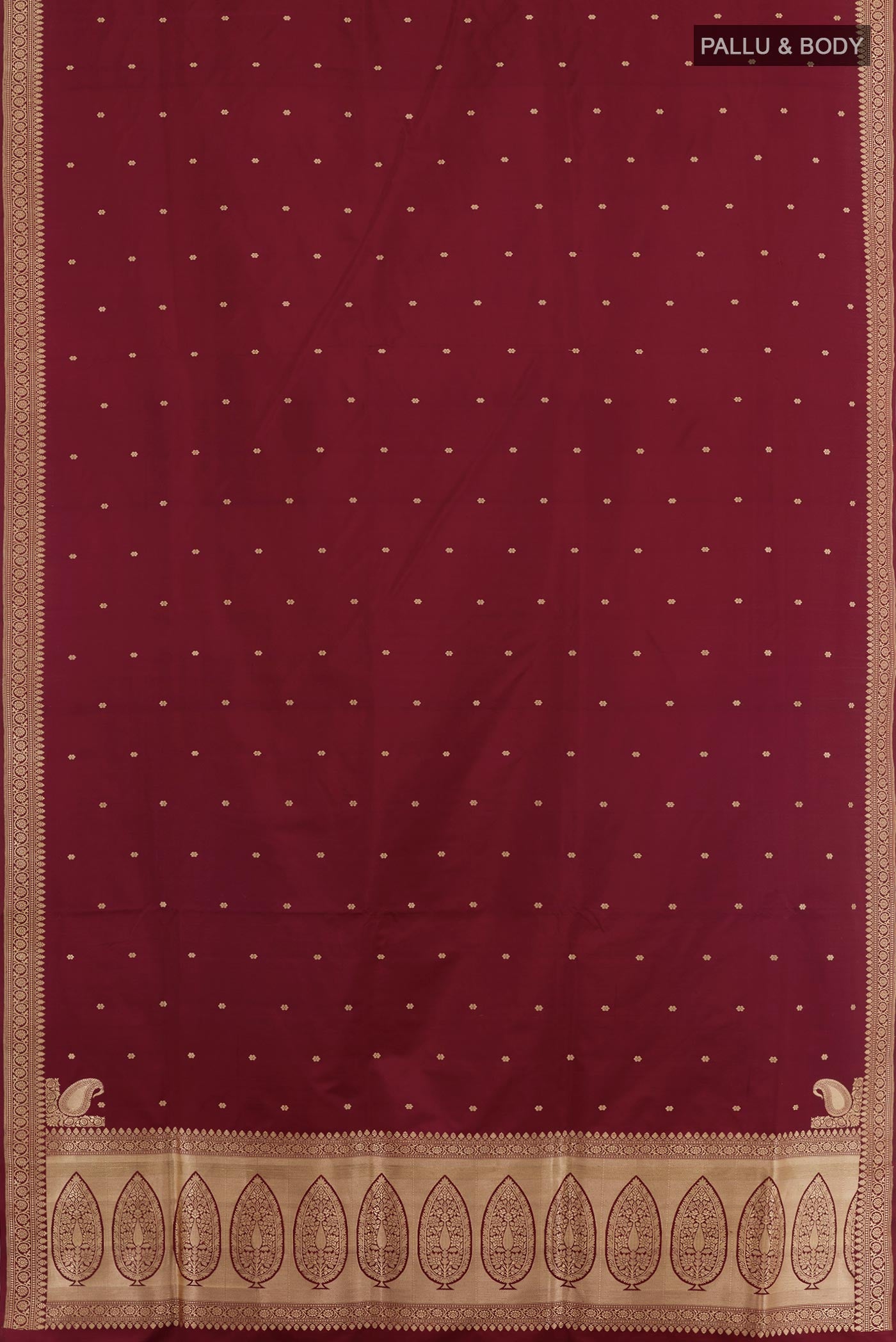 Flat view of Maroon Banarasi Silk Saree with Zari Butta on the body and Zari Border. 
