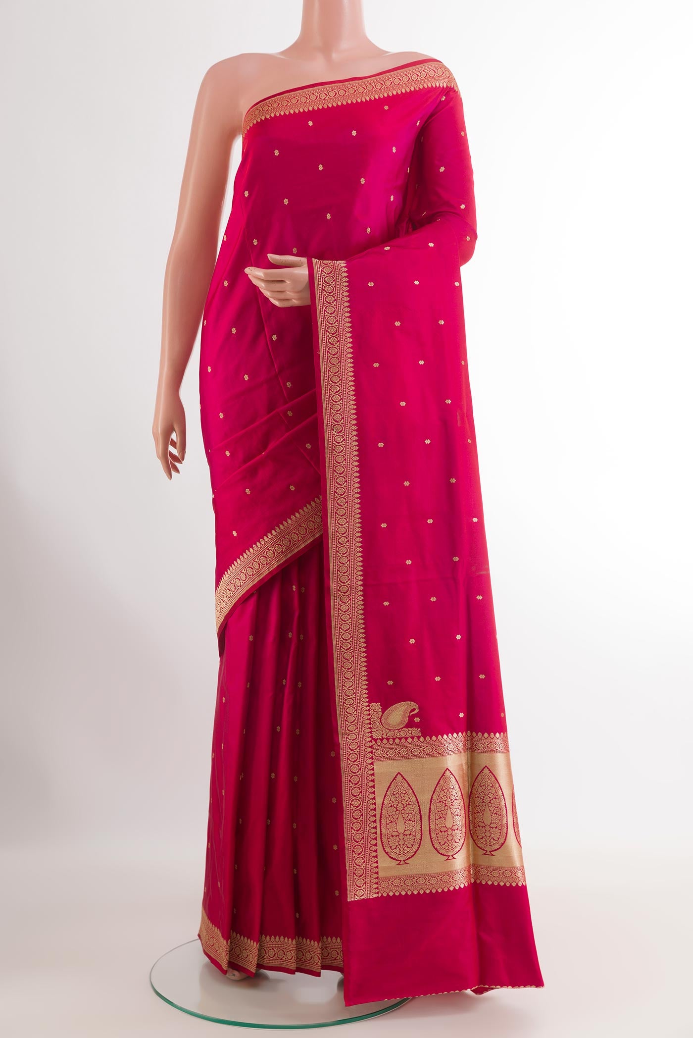 Pink Banarasi Silk Saree with Zari Butta on the body and Zari Border.  displayed on a mannequin