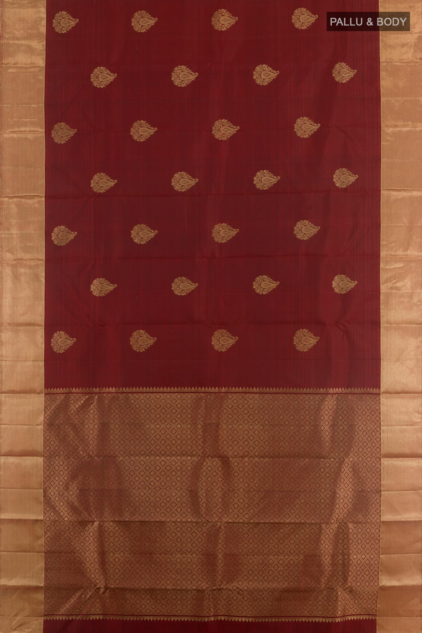 Flat view of Maroon Kanchipuram Silk Saree with Zari Butta on the body and Zari Border. 