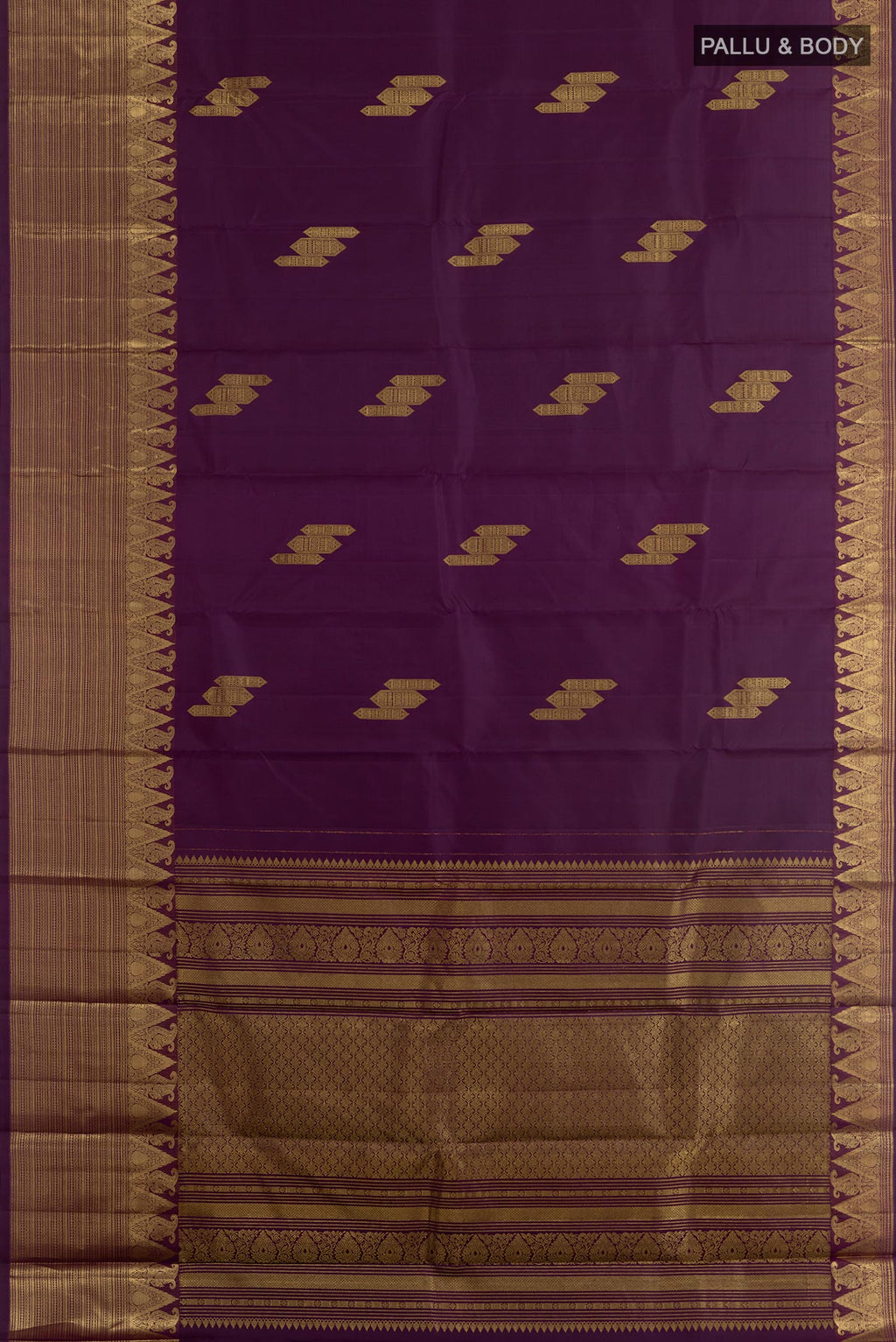 Flat view of Purple Kanchipuram Silk Saree with Zari Butta on the body and Zari Border. 