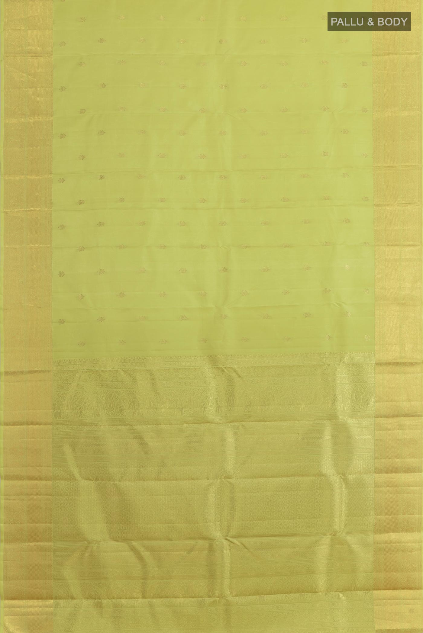 Flat view of Green Kanchipuram Silk Saree with Zari Butta on the body and Zari Border. 