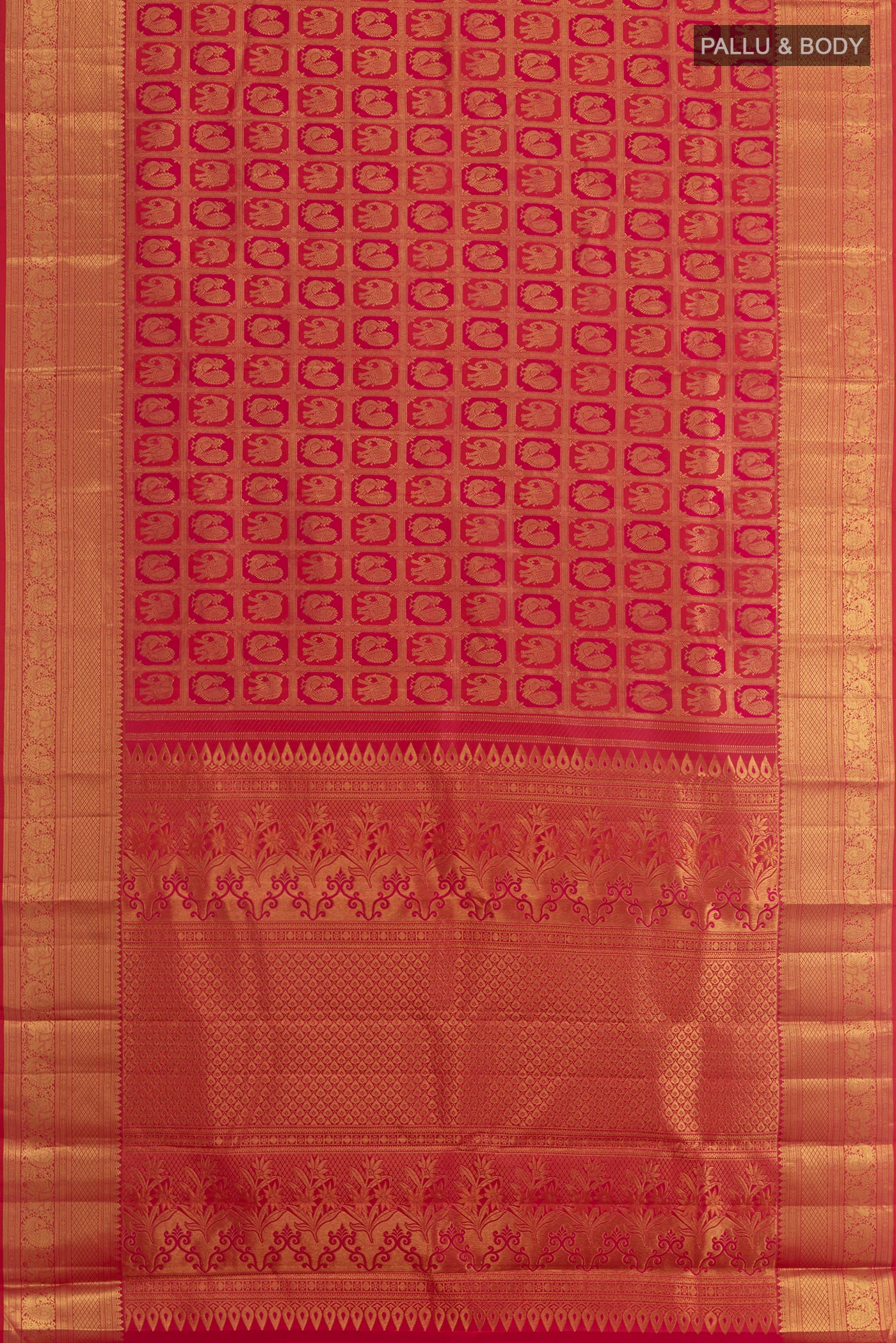 Flat view of Red Kanchipuram Silk Saree with Zari Brocade on the body and Zari Border. 