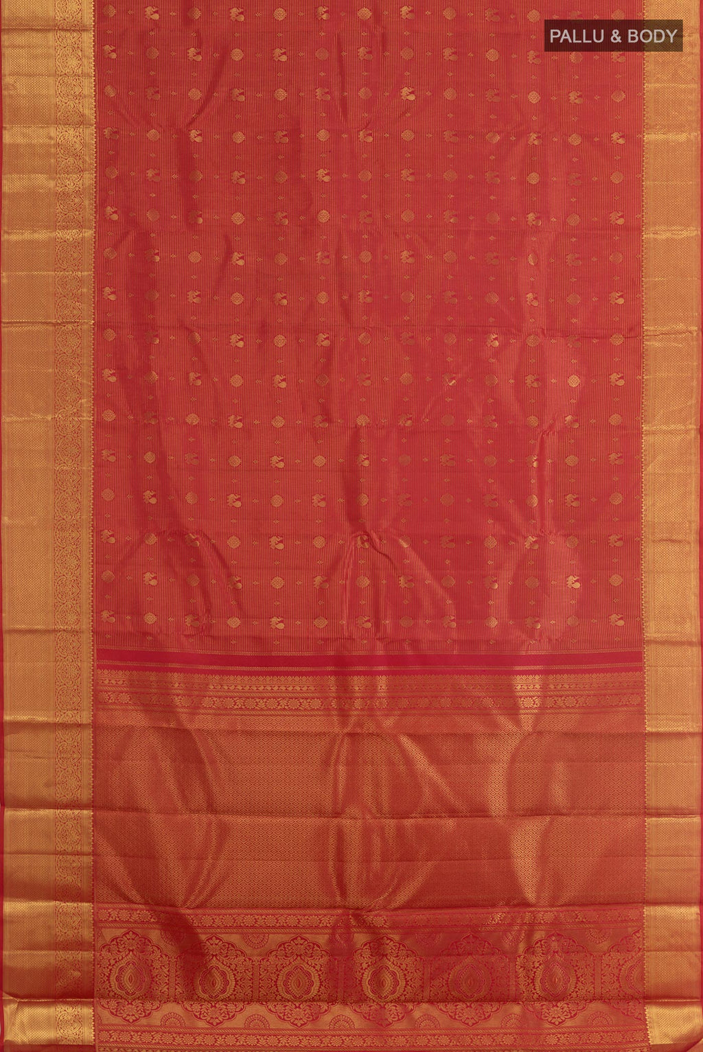 Flat view of Red Kanchipuram Silk Saree with Zari Butta on the body and Zari Border. 
