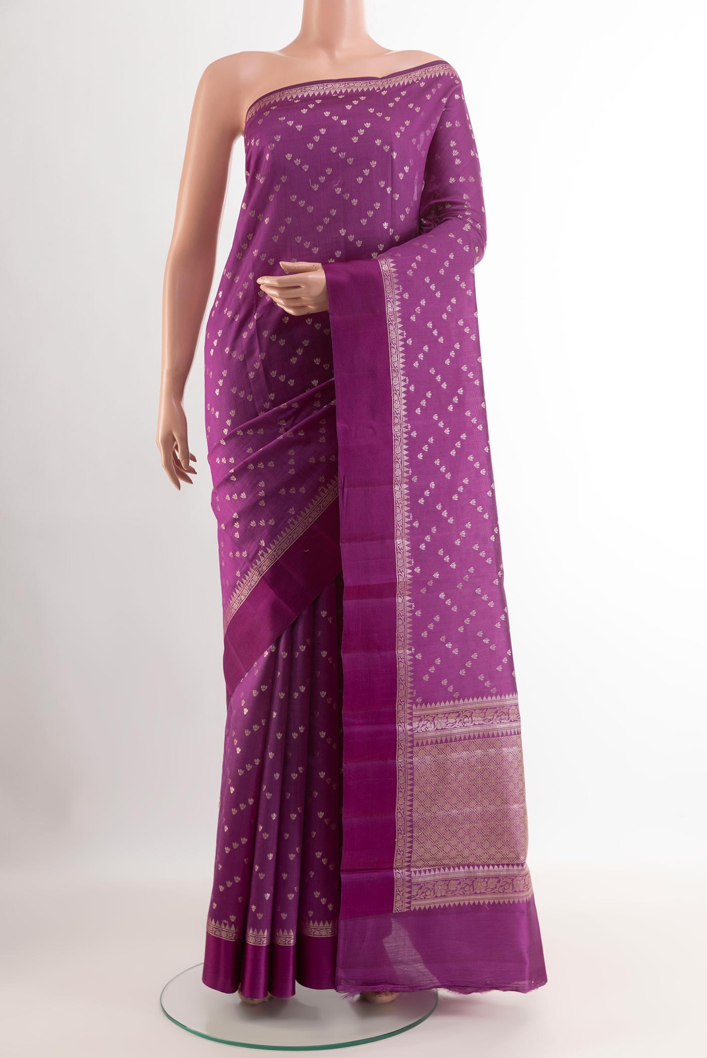 Purple Tussar Silk Saree with Zari Butta on the body and Zari Border.  displayed on a mannequin