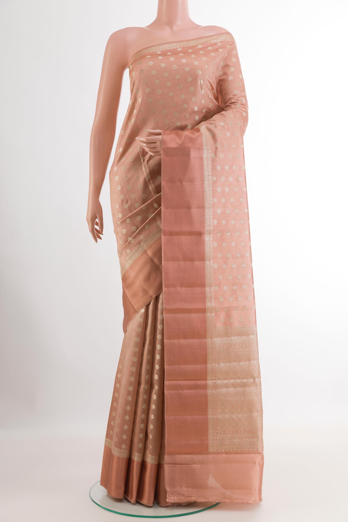 Imperial Pink Tussar Silk Saree with Zari Butta on the body and Zari Border.  displayed on a mannequin