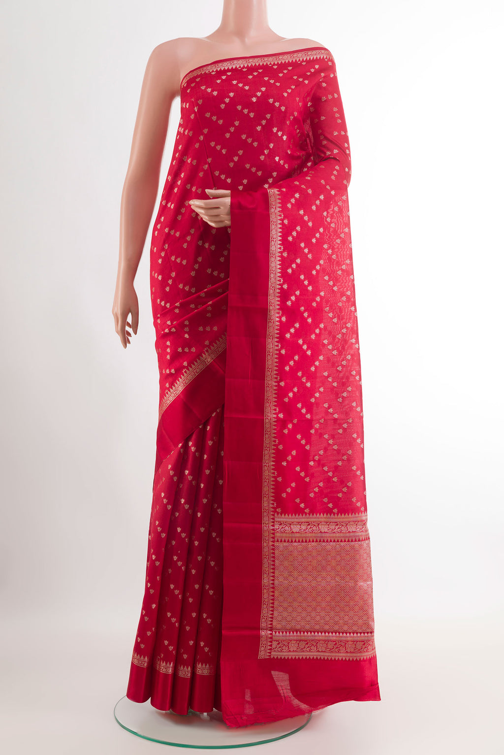 Red Tussar Silk Saree with Zari Butta on the body and Zari Border.  displayed on a mannequin