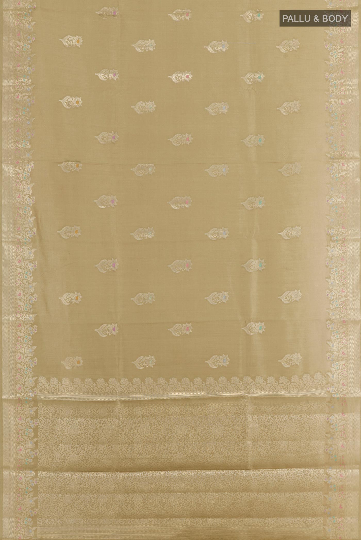 Flat view of Beige Tussar Silk Saree with Zari Butta on the body and Zari Border. 