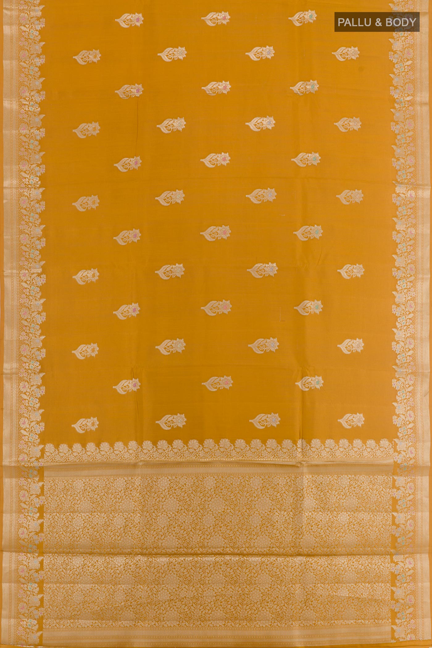 Flat view of Mustard Tussar Silk Saree with Zari Butta on the body and Zari Border. 