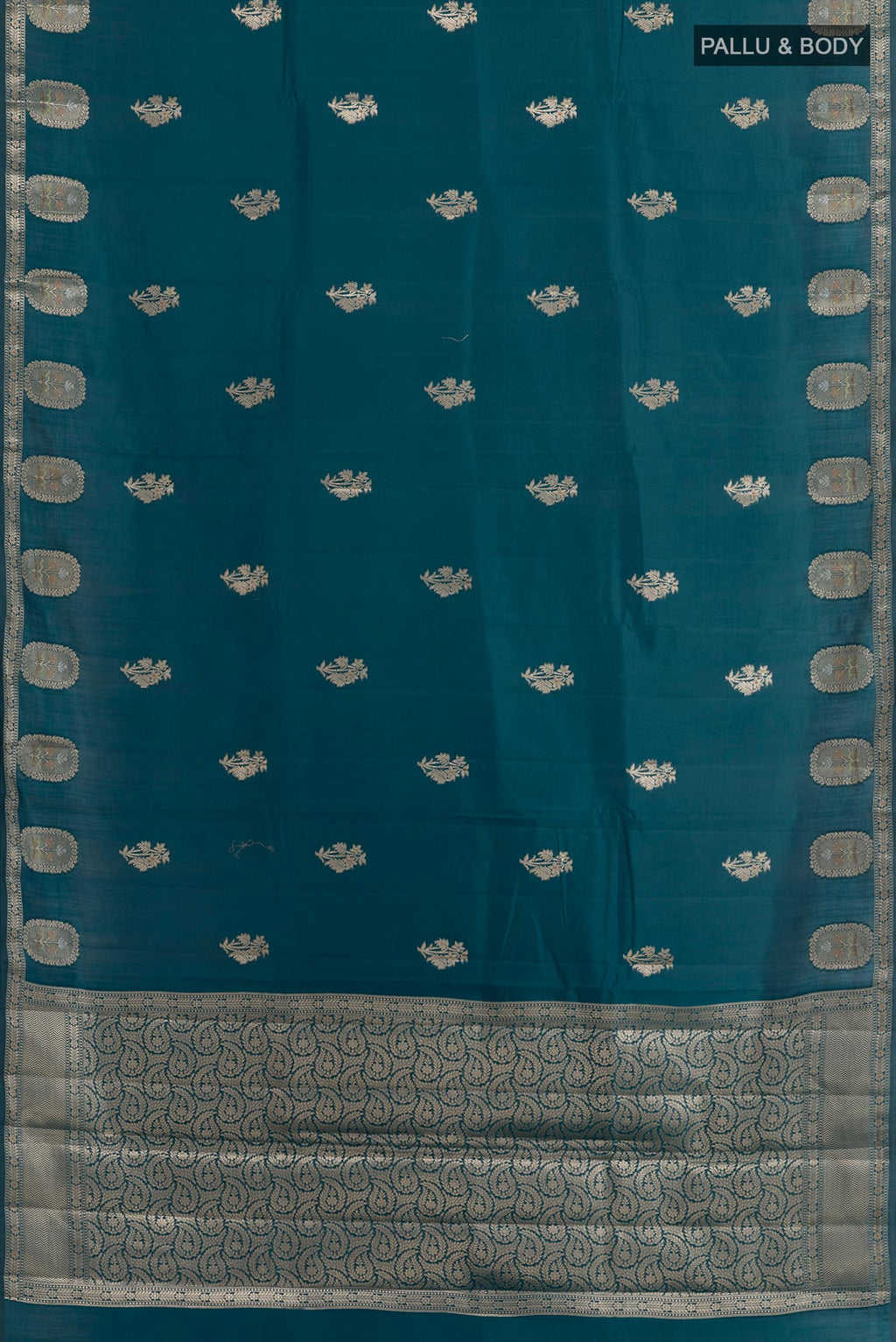 Flat view of Royal Blue Tussar Silk Saree with Zari Butta on the body and Zari Border. 